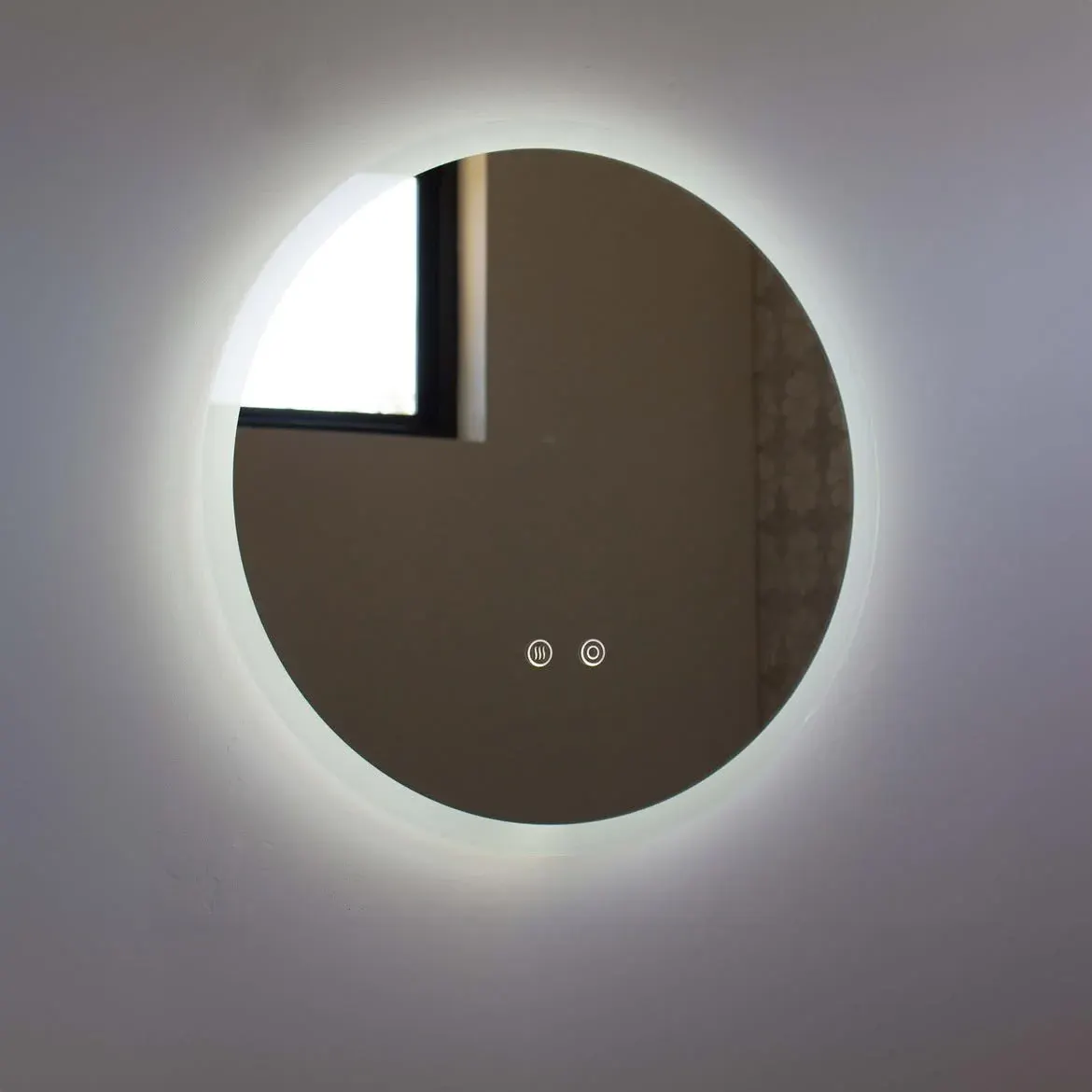 Vanity lighting detail in a remodeled bathroom
