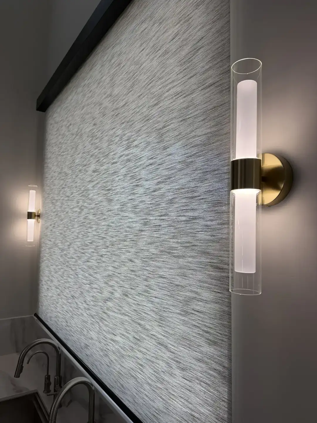 Brass cylinder sconce installed by CZR Electric in a custom East Valley kitchen