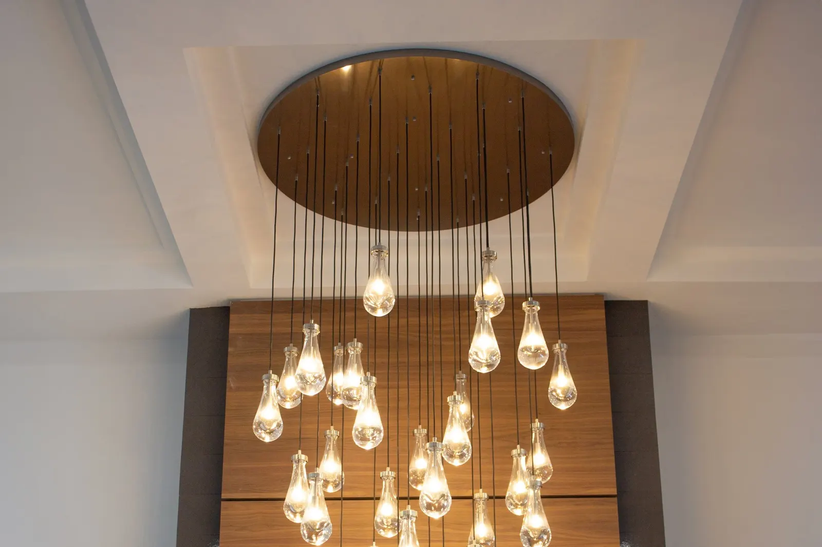 Teardrop pendant lights over a kitchen island